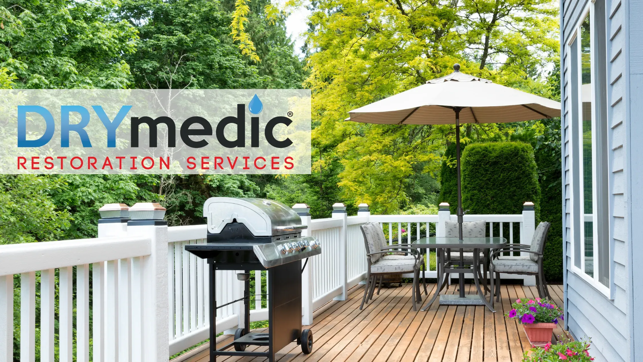 Outside deck with grill and patio furniture